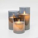 LED Bloklys sæt i røgfarvet glas Ø7,5cm, 3 stk, vippende flamme - Inkl. fjernbetjening og timer, 10/12,5/15cm høj, ægte stearin