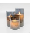 LED Bloklys sæt i røgfarvet glas Ø7,5cm, 3 stk, vippende flamme - Inkl. fjernbetjening og timer, 10/12,5/15cm høj, ægte stearin