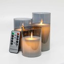 LED Bloklys sæt i røgfarvet glas Ø7,5cm, 3 stk, vippende flamme - Inkl. fjernbetjening og timer, 10/12,5/15cm høj, ægte stearin