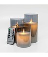 LED Bloklys sæt i røgfarvet glas Ø7,5cm, 3 stk, vippende flamme - Inkl. fjernbetjening og timer, 10/12,5/15cm høj, ægte stearin